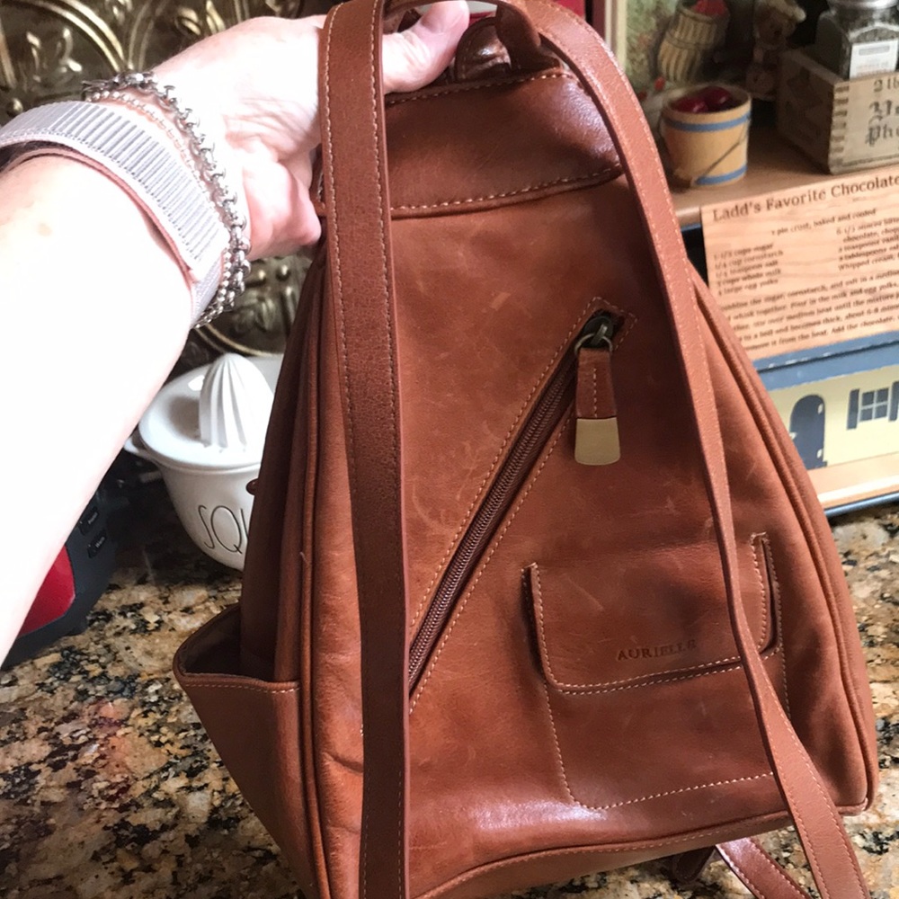 A med size Aurielle backpack purse. Leather